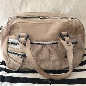 L.A.M.B. handbag.